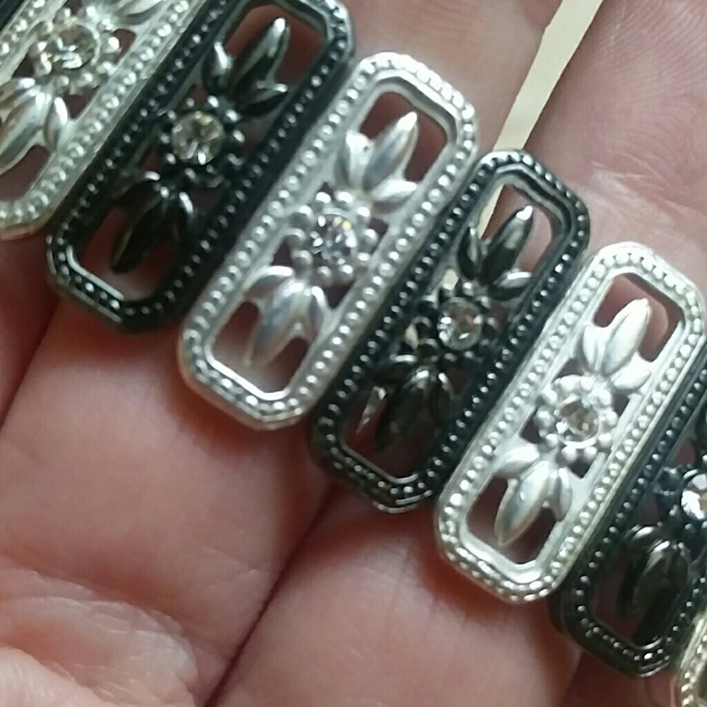 detailed two-tone silver rhinestone floral pattern bracelet